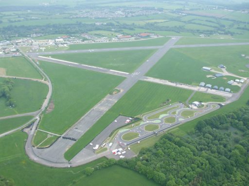 Arial image of Dunkeswell airfield showing buildings and race track