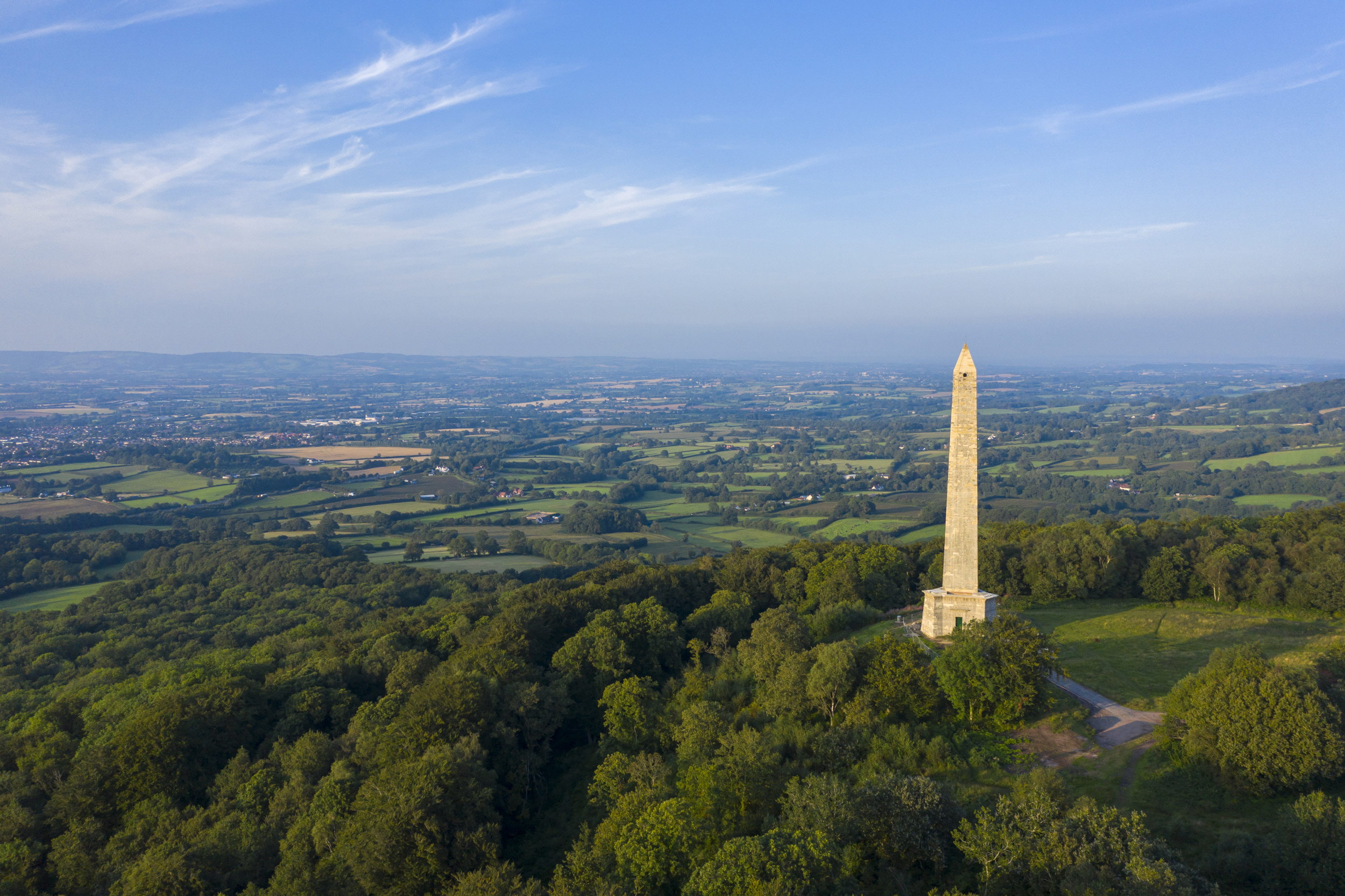 Wellington Monument and surrounding countryside on a bright day with blue skies
