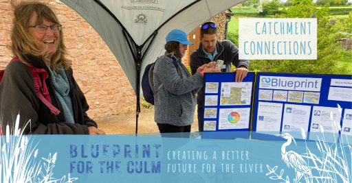 Connecting the culm man talking to a lady beside a display board