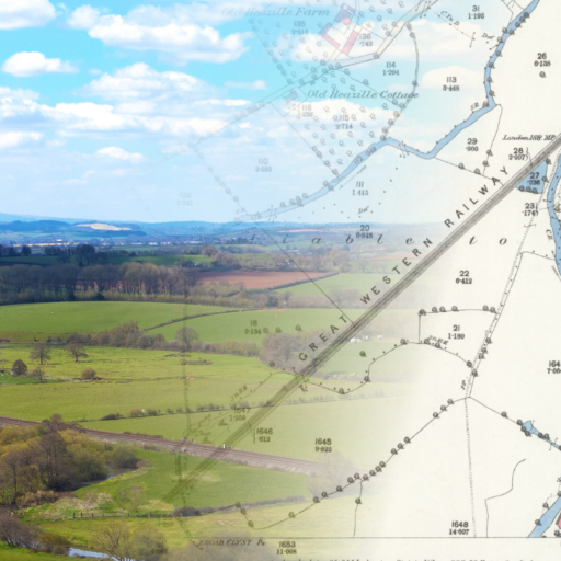 An old map overlaid with a modern photograph of a landscape.